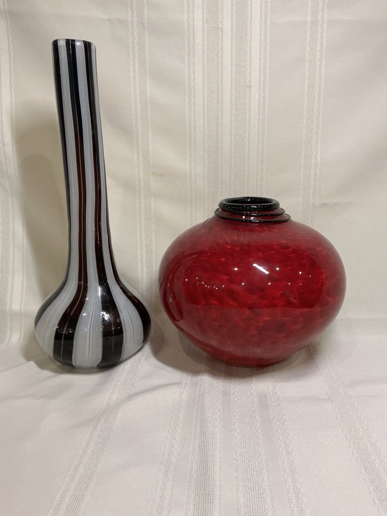 Hand blown red glass vase and tall striped vase. - image 1 of 5
