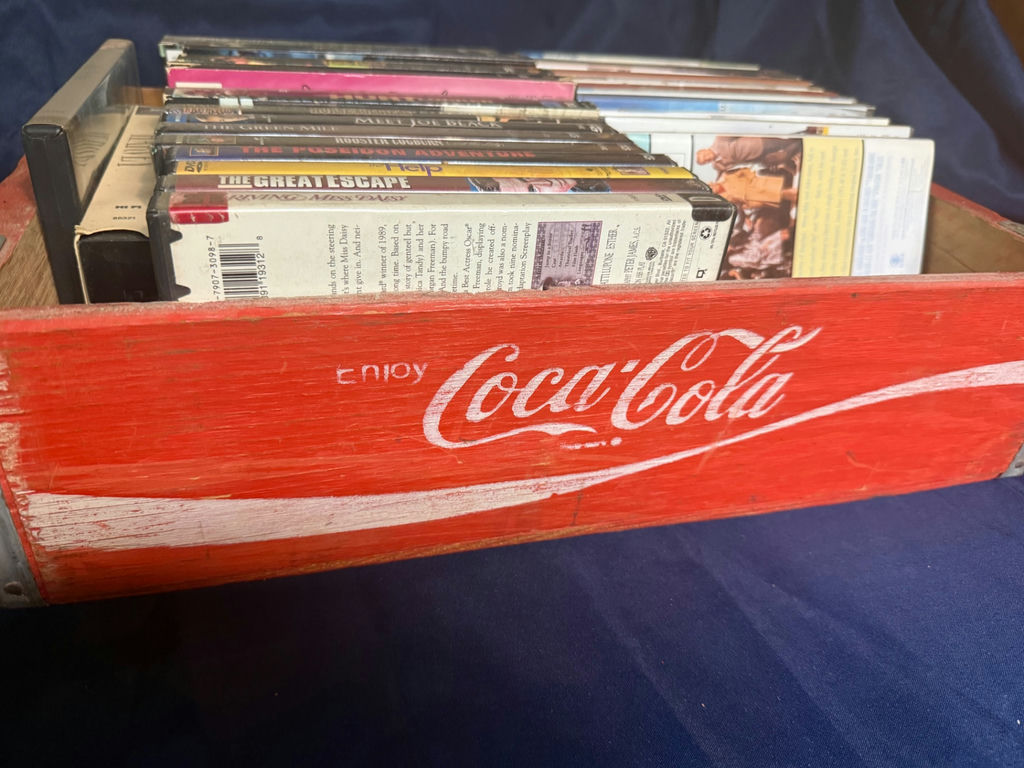 Red Coca-Cola crate with VHS tapes - image 1 of 4