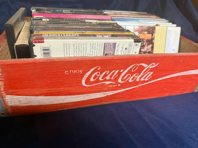Red Coca-Cola crate with VHS tapes - Image 1 of 4
