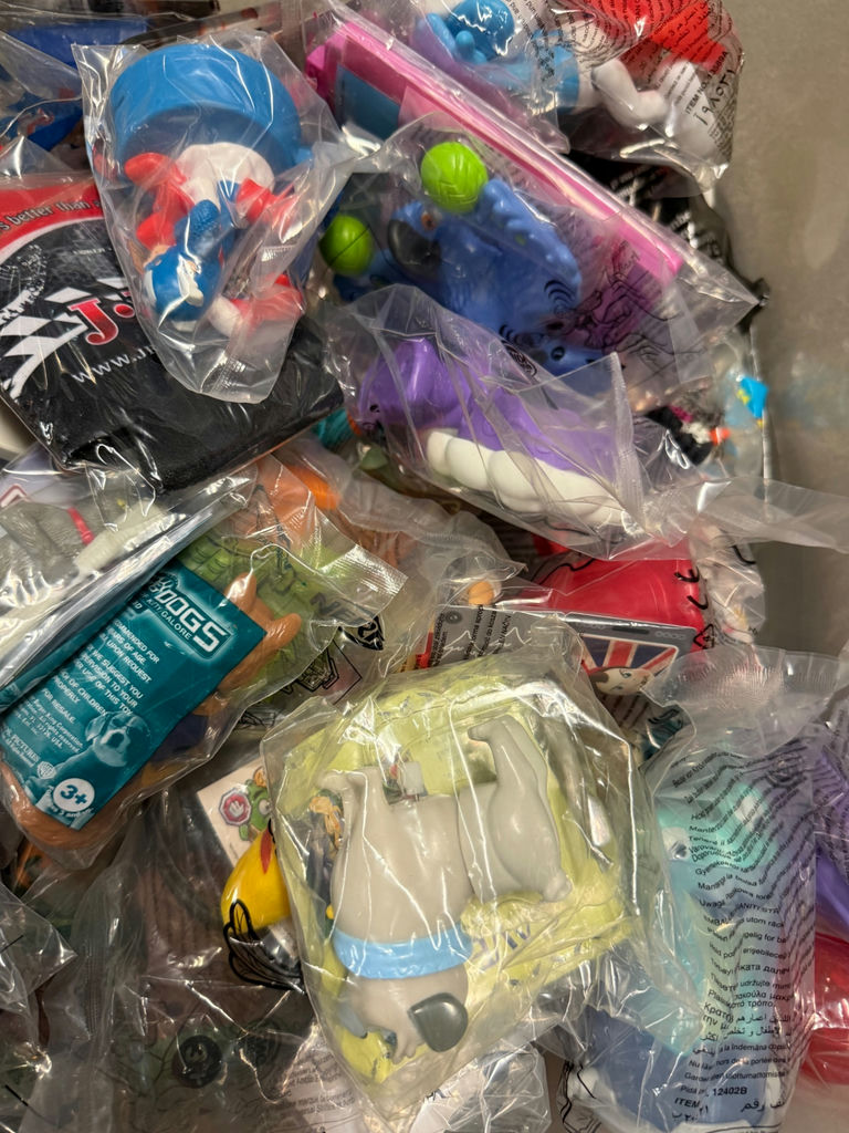 Assorted small toy figures and accessories in bags - image 5 of 6
