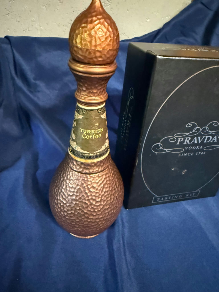 Hammered copper Turkish coffee decanter, Pravda vodka tasting kit, and ceramic bear statue - image 1 of 5