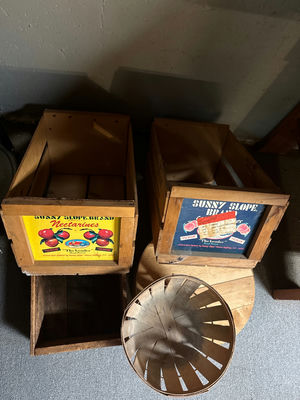 Vintage wooden fruit crates with advertising panels and a round metal basket - Image 1 of 2