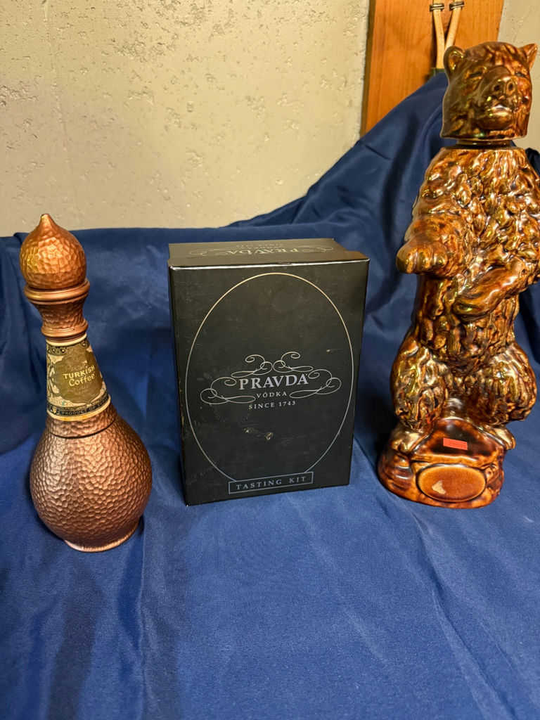 Hammered copper Turkish coffee decanter, Pravda vodka tasting kit, and ceramic bear statue - image 2 of 5