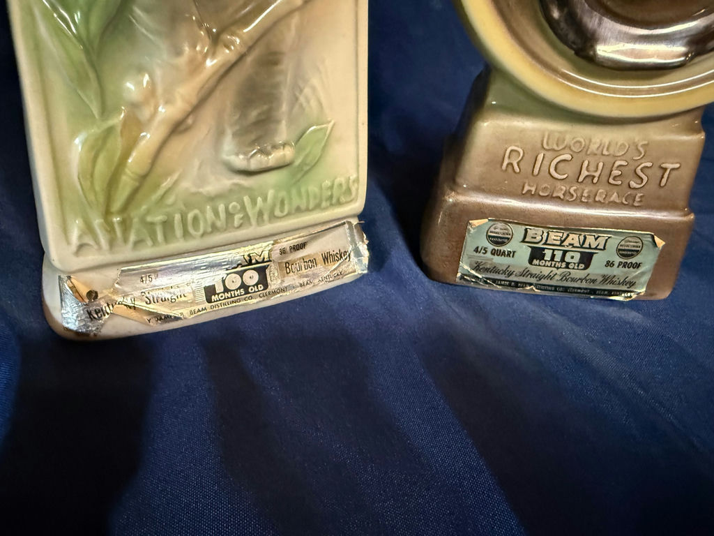 Vintage ceramic liquor decanters: Southeast Asia map tile and horse-head topper - image 1 of 3