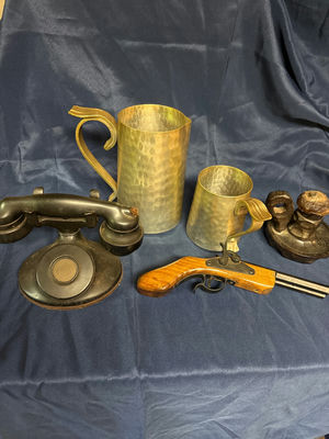 Antique hammered metal pitchers, a vintage black telephone device, and a wooden-stock pistol - Image 1 of 4