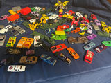 Assorted toy vehicles (die-cast cars, trucks, motorcycles, and military/construction vehicles) - thumbnail 1 of 4