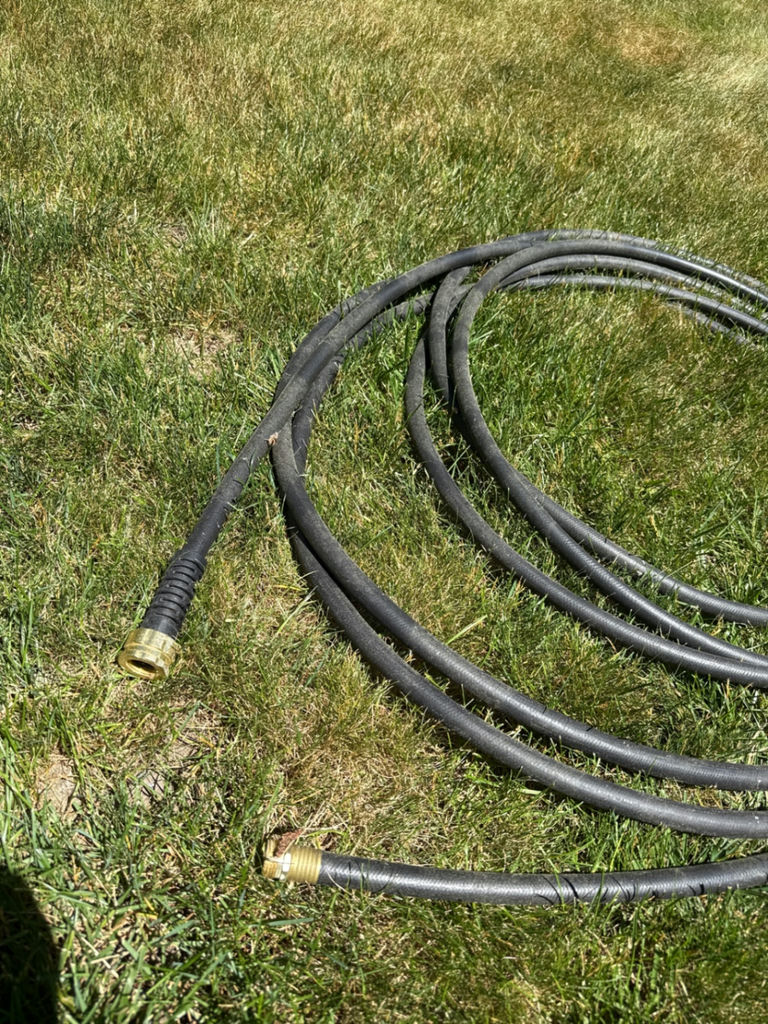 Coiled black hose with brass fittings - image 2 of 2