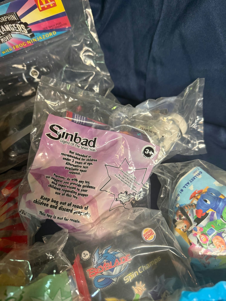 Assorted sealed toy bags and figure packs - image 4 of 6