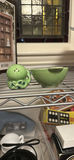 Assorted home and kitchen items including decorative figurines and a Crock-Pot - thumbnail 5 of 6