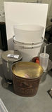 Assorted metal and plastic household trash cans and a cocoa tin - thumbnail 2 of 6