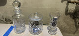 Waterford Crystal Decanter, Lidded Jar, and Footed Vase - thumbnail 1 of 5