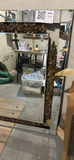 Ornate floral-framed wall mirror with assorted items - thumbnail 2 of 4