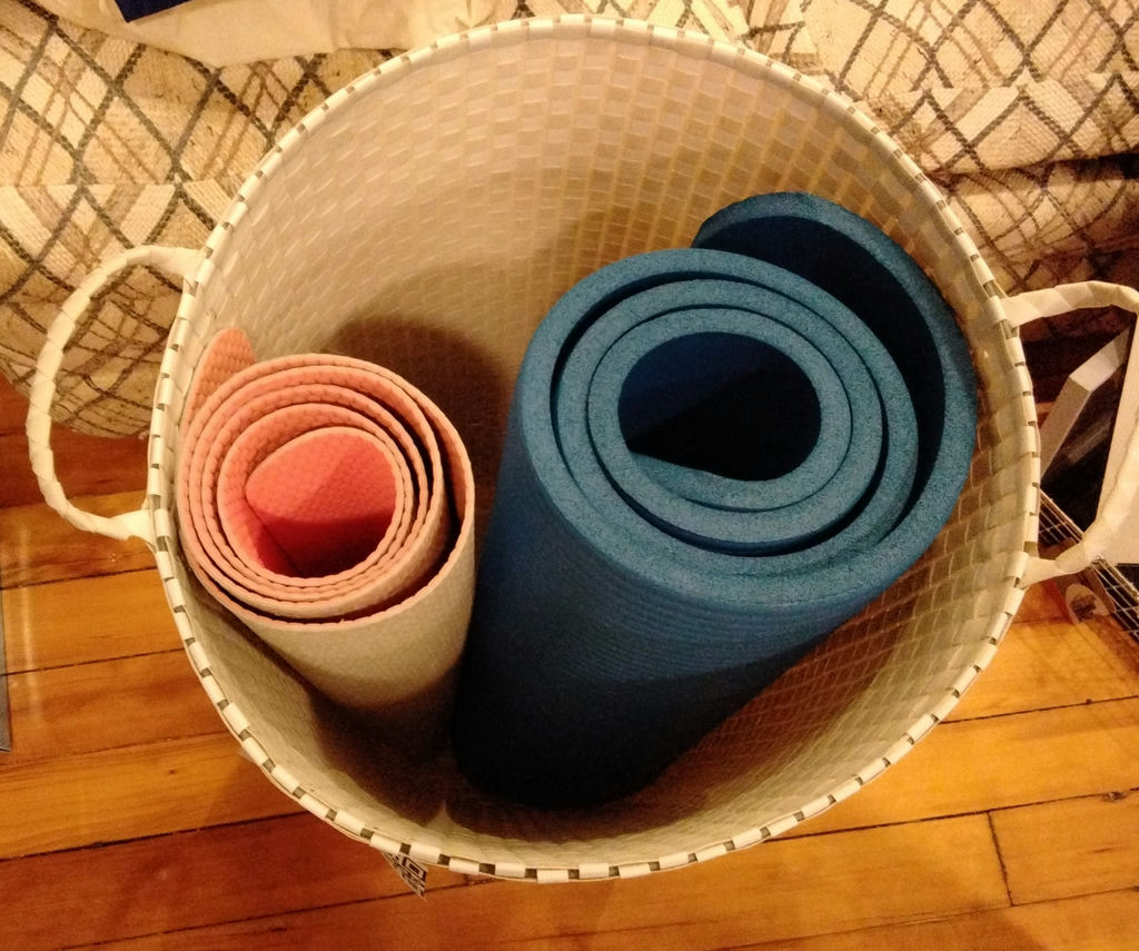 Basket with rolled yoga mats and a foam roller - image 3 of 3