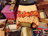 Stacked storage drawers with clothing and fabrics - thumbnail 4 of 6