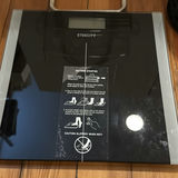 Assorted kitchen scale, risers, and shelving organizers - thumbnail 2 of 6