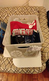 Clothing and Books in Storage Containers - thumbnail 1 of 6