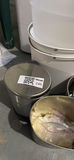 Assorted metal and plastic household trash cans and a cocoa tin - thumbnail 1 of 6