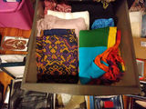 Stacked storage drawers with clothing and fabrics - thumbnail 3 of 6