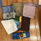 Stacked storage drawers with clothing and fabrics - thumbnail 1 of 6
