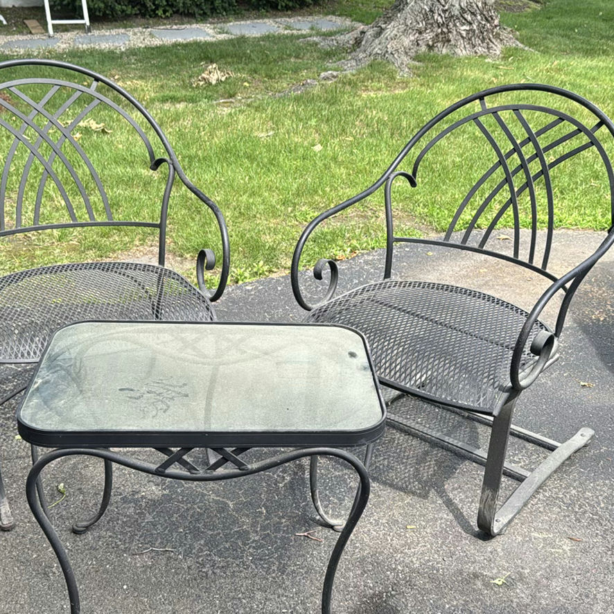 Outdoor metal patio chairs with glass-top table - image 1 of 4