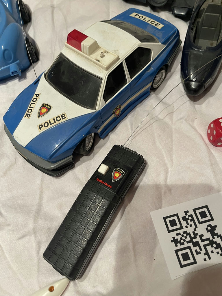 Assorted Toy Vehicles, Disneyland Water Bottles, and Doll - image 4 of 6