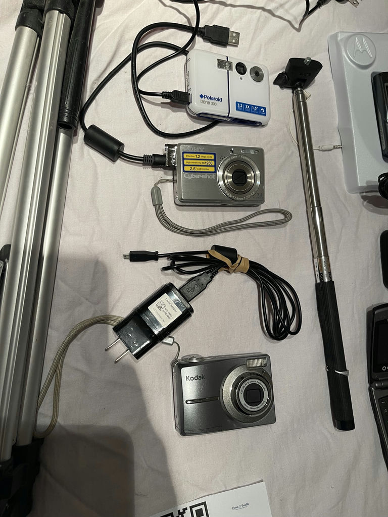 Tripod, Assorted Digital Cameras, Cell Phones, and Electronics Accessories - image 5 of 9