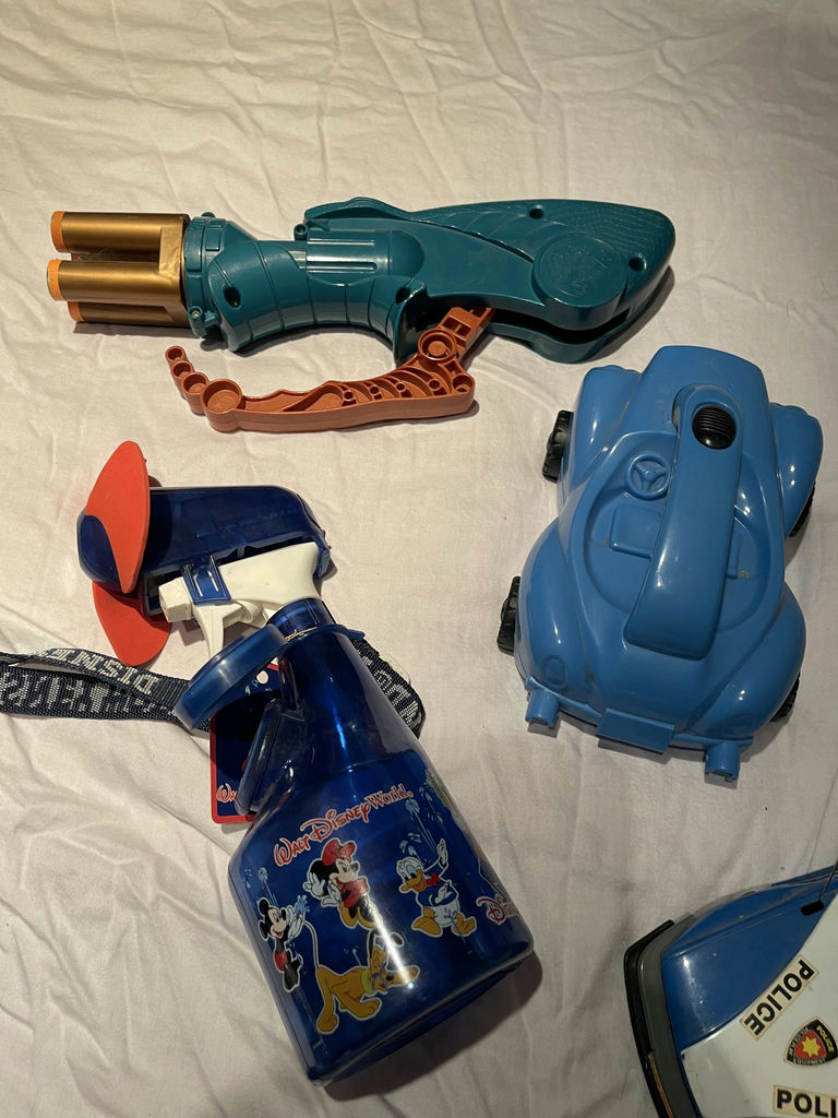 Assorted Toy Vehicles, Disneyland Water Bottles, and Doll - image 5 of 6