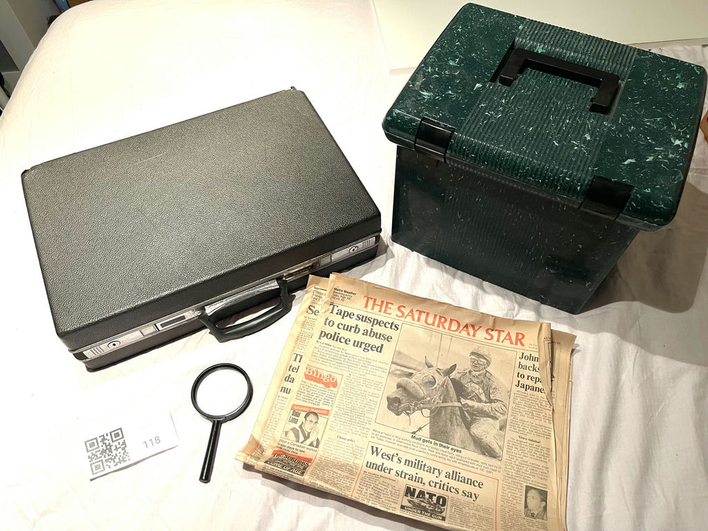 Samsonite Briefcase, Storage Box, Magnifying Glass, Newspaper, and Tall Shelf - image 1 of 10