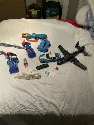Assorted Toy Vehicles, Disneyland Water Bottles, and Doll - Image 1 of 6