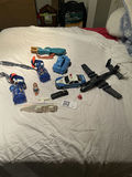 Assorted Toy Vehicles, Disneyland Water Bottles, and Doll - thumbnail 1 of 6