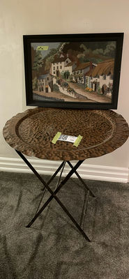 Hammered Metal Folding Tray Table and Framed Village Needlepoint Artwork - Image 1 of 9