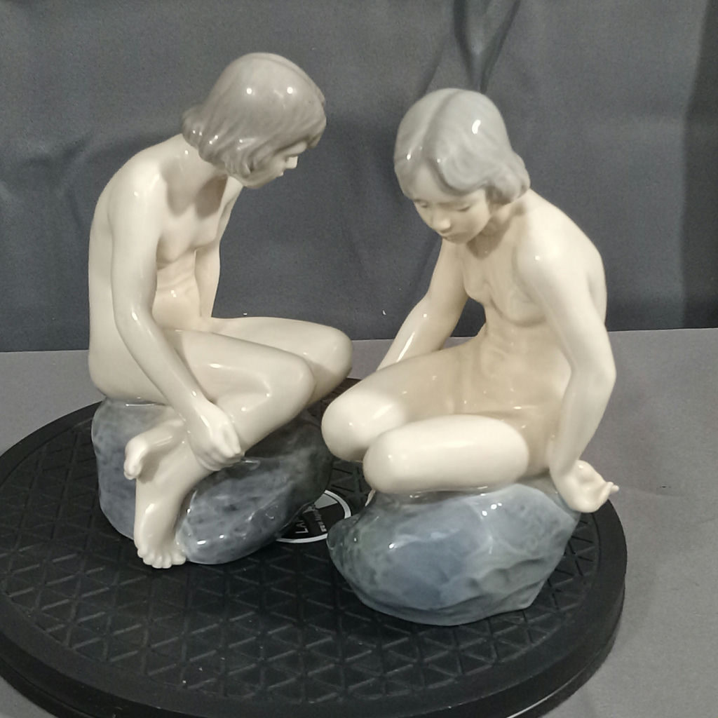 Royal Copenhagen Girl on Rock Figurines - image 1 of 9