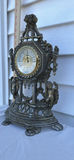 Ornate Vintage Metal Mantel Clock with Cherub Figures - thumbnail 4 of 7