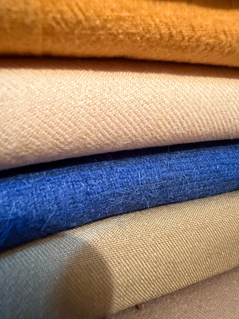 Stack of folded fabrics - image 3 of 3