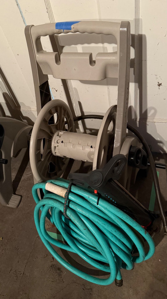 Garden hose on a reel cart - image 1 of 2