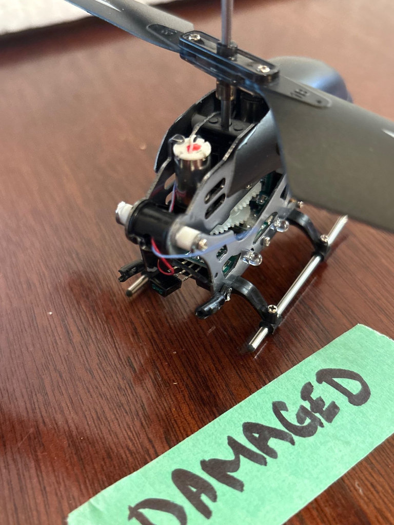 Collection of remote-controlled helicopters and car - image 7 of 8