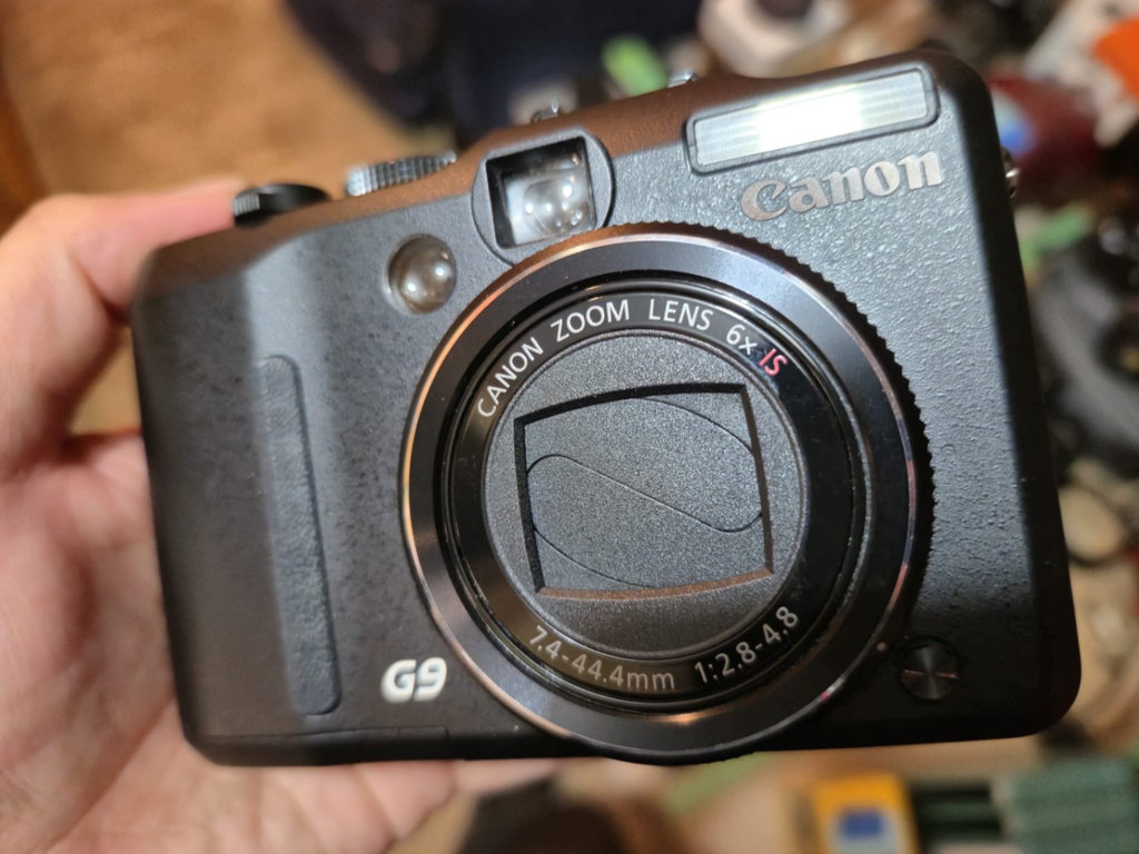 Canon PowerShot S95 digital camera and Canon ZR950 MiniDV camcorder - image 1 of 4