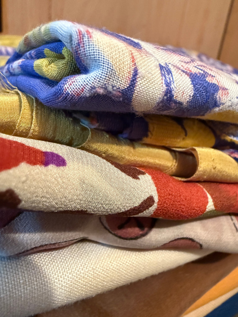 Stack of folded fabrics - image 2 of 3