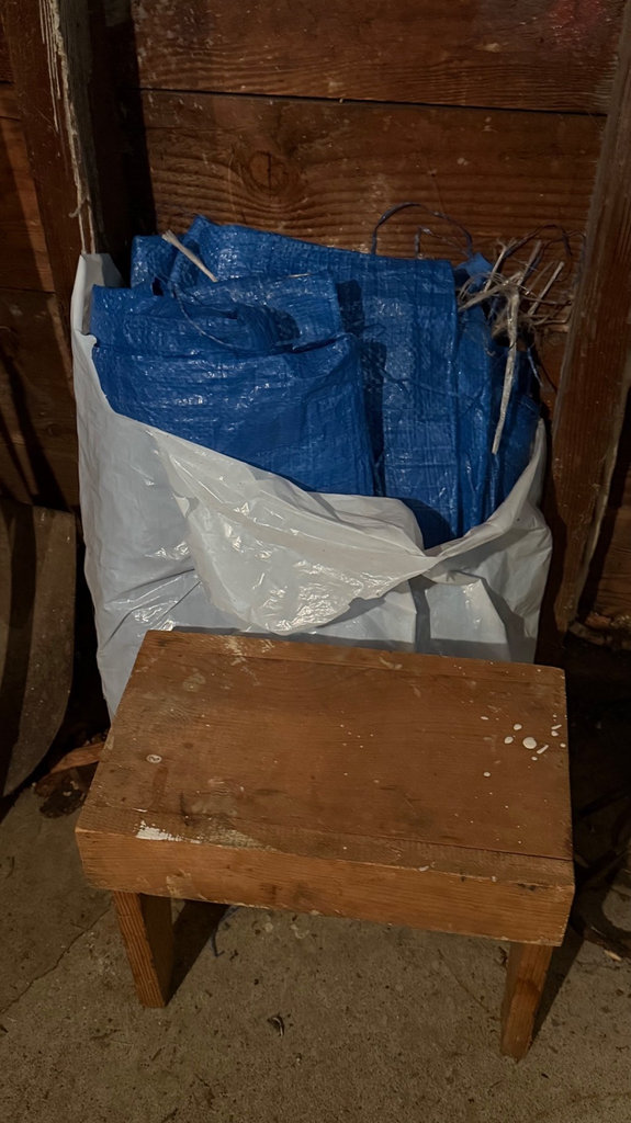 Garage tool collection with shovels, cords, and tarps - image 6 of 6