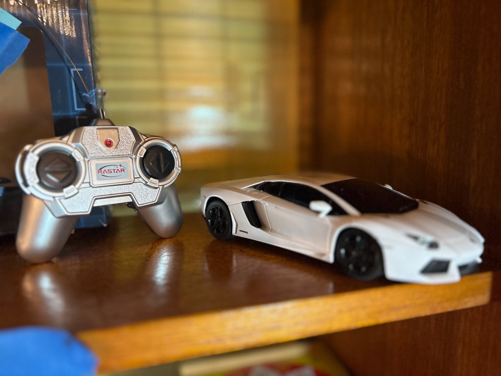 Collection of remote-controlled helicopters and car - image 2 of 8