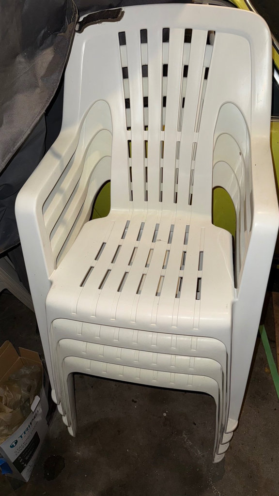 Stackable White Plastic Chairs with cover - image 1 of 6