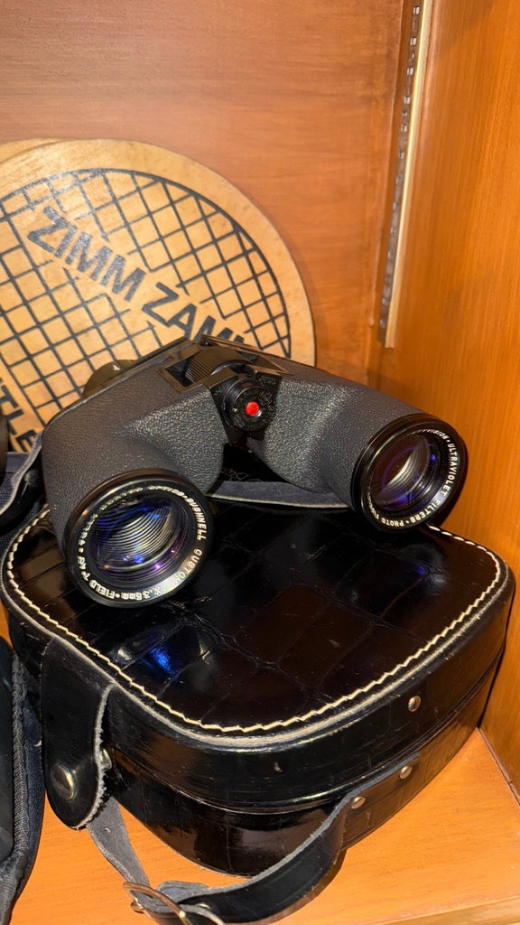 White ice skates with binoculars and protective gear - image 3 of 4