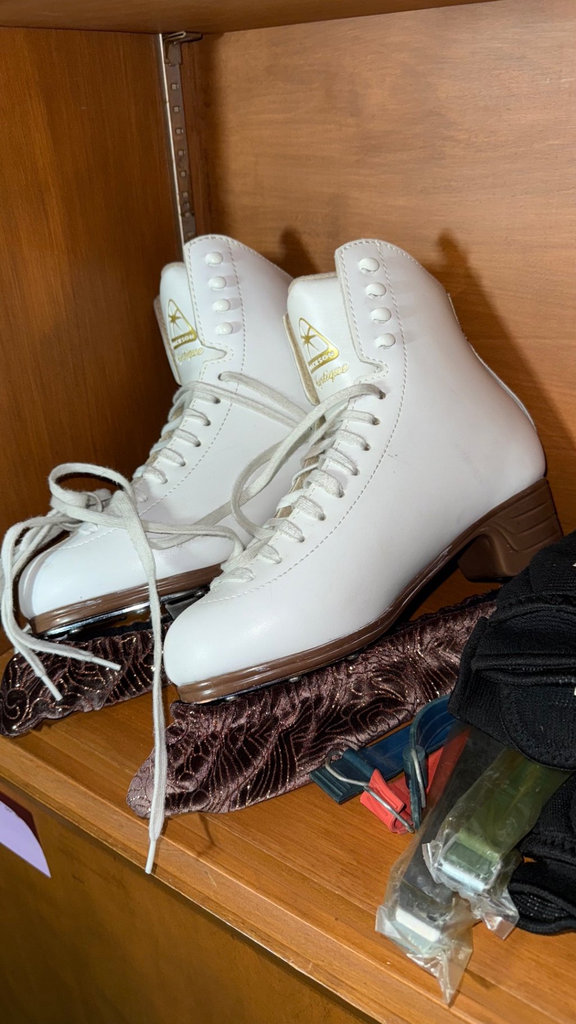 White ice skates with binoculars and protective gear - image 4 of 4