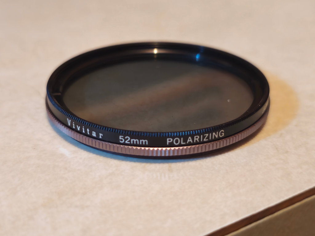 Camera lens filters and Lowepro bag - image 1 of 6