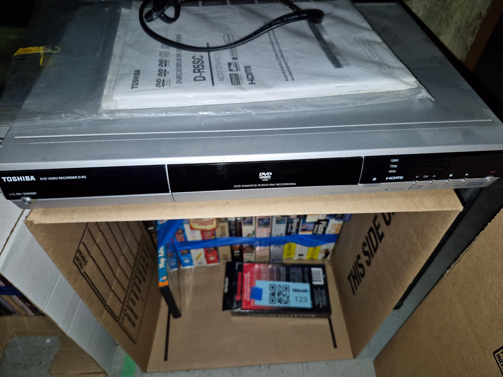 Toshiba DVD recorder with DVD collection and video head cleaner - image 2 of 7