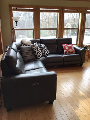 Dark gray leather sectional sofa with power recliners and decorative pillows - Image 1 of 6