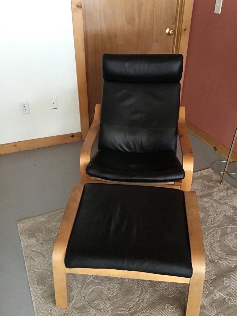Black leather lounge chair with ottoman - image 1 of 2