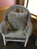 White wicker chair with patterned cushion - thumbnail 1 of 2