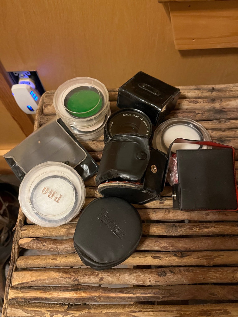 Lot of small camera lenses and accessories - image 1 of 1