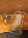 Floral Pyrex bowl, ceramic casserole dish, lace-pattern glass tray, and blue goblet - thumbnail 4 of 4